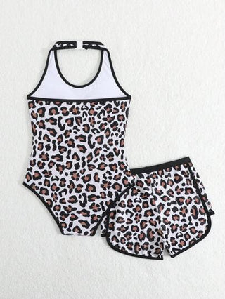 SHEIN بدلة سباحة قطعة واحدة من نمط فهد بكشكشات مع شورت مطبوع بشكل عشوائي للفتيات المراهقات