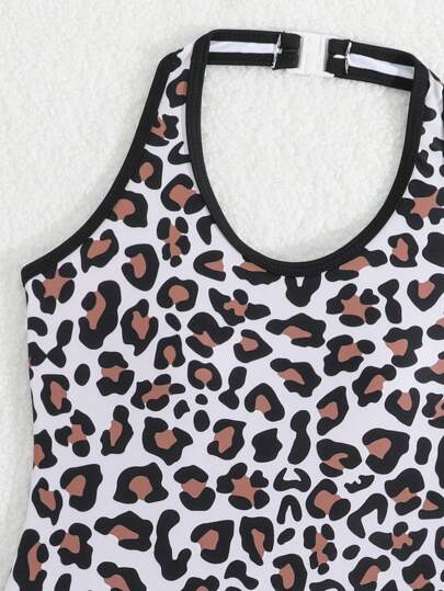 SHEIN بدلة سباحة قطعة واحدة من نمط فهد بكشكشات مع شورت مطبوع بشكل عشوائي للفتيات المراهقات