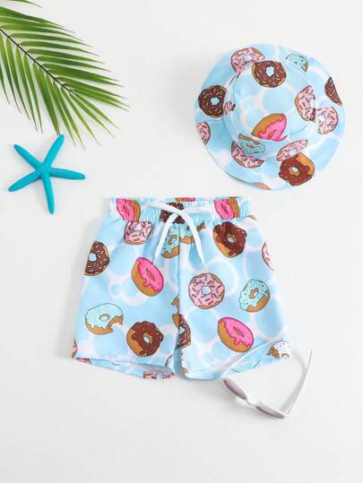 مايوه أولادي صغار الأولاد شورت شاطئ مخملي مطبوع عليه الدونات مع قبعة شمسية، مناسب للعطلة الصيفية