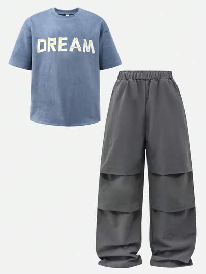 مايوه حريمي قطعة واحدة مجموعة سراويل ذات لون قُطني و ملابس علوية قصيرة الأكمام مطبوعة بحرف للأولاد 2 قطعة