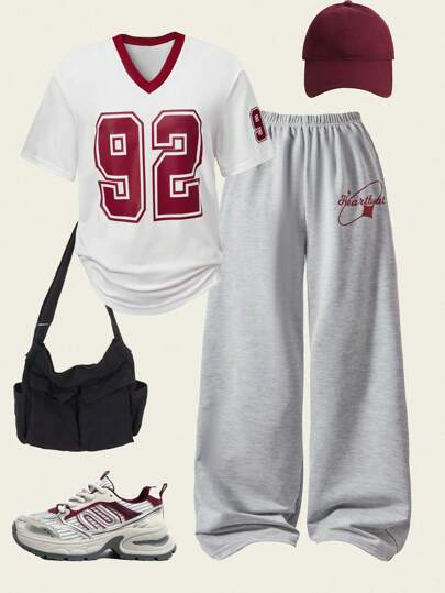 مجموعة 2 قطعة طقم من سيدة رياضية بطباعة أرقام بفتحة رقبة على شكل حرف V وأكمام قصيرة ، وبنطلون بساق واسعة