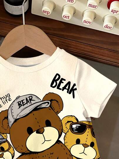 SHEIN تي شيرت أولادي كاجوال بياقة مستديرة فضفاض بأكمام قصيرة، مناسب للصيف