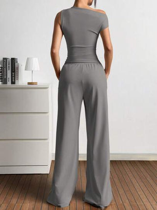 EZwear مجموعة ملابس علوية وبنطلون محبوك ذو نهايات غير متماثلة لون واضح، 2 قطعة للمرأة