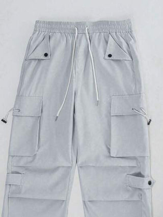 Manfinity EMRG بنطلون رجالي فضفاض من نوع البضائع ذو لون واحد مع جيوب متعددة