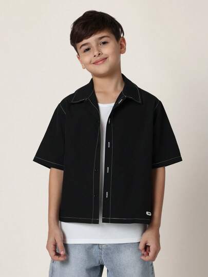 SUMWON ملابس علوية برقبة مزودة بأزرار من طراز كاجوال قصير الأكمام بقصة ضيقة من تصميم كلاسيكي روتروستايل من مجموعة Sumwon الأسطورية للملابس الشبابية الصيفية العصرية