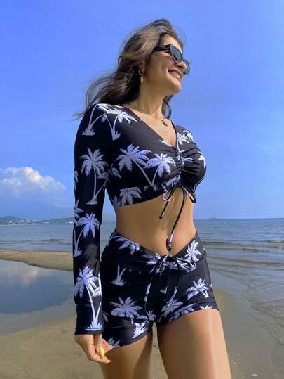 Swim Vcay مجموعة من قطعتين من ملابس السباحة للنساء ذات أكمام طويلة ورباط مرسوم عليها شجر جوز الهند المثير (منتج مرخص)