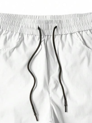 Manfinity Homme بنطلون رجالي لون أحادي الخصر بحبل شد الخصر جيوب كارجو ساق مستقيمة