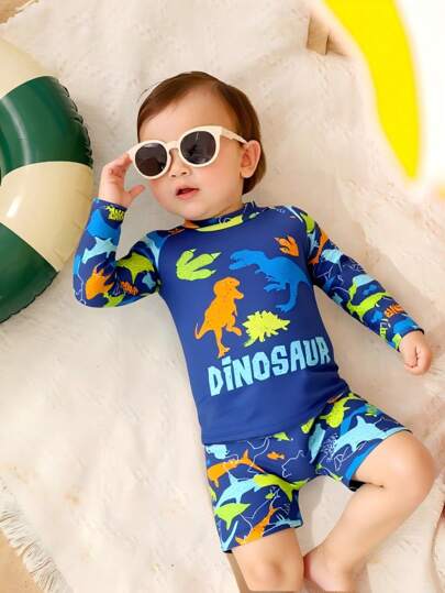 مايوه أولادي مجموعة ملابس سباحة للأولاد الرضع 2 قطعة، تي شيرت أكمام طويلة برقبة مقطعة بطبعة السمكة القرش وألوان متباينة مع شورت سباحة منفصل