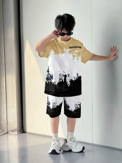SHEIN بدلة شورت وتي شيرت مطبوع بأحرف للأطفال الأكبر سنًا بطراز الملابس الشارعي الفضفاضة