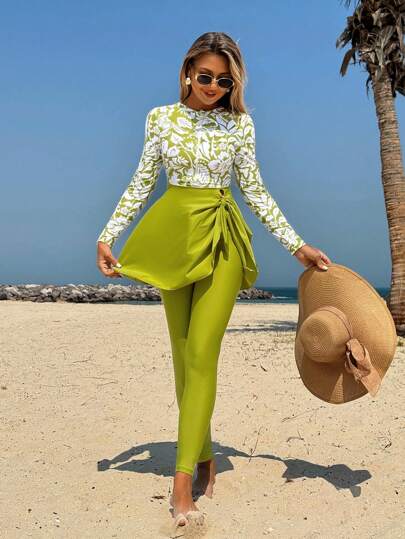 Swim Mulvari مجموعة بوركيني نسائية من تي شيرت أكمام طويلة وسراويل طويلة بتصميم عادي وتنورة قصيرة مطبوعة بسحاب على الجانب الأيسر بخصر قابل للتعديل، بتصميم مريح وقصة منسدلة مناسبة للشاطئ