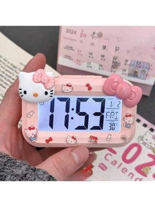 Sanrio ساعة منبه صغيرة هالو كيتي من سانريو - ساعة طاولة صغيرة بتصميم كيوت متعددة الوظائف محمولة للطلاب و ديكور المنزل | منتج رسمي معتمد ديكور غرفة ساعة رقمية