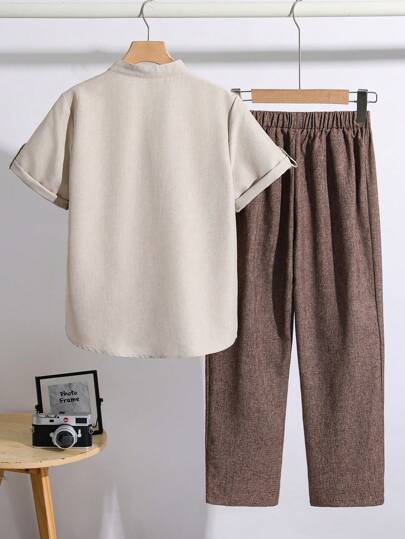 SHEIN طقم قميص أكمام قصيرة وبناطيل كاجوال للصبية المراهقين