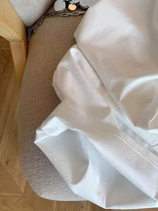 بنطلون مستقيم الساق للنساء بقصة مريحة بتطريز خيالي بسيط بلون أحادي
