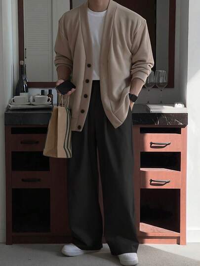 DAZY بنطلونات كاجوال فضفاضة ذات ساق واسعة بلون أسود بنقشة سادة للرجال في الربيع