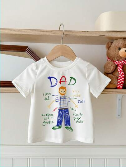 SHEIN ملابس علوية طفل ولد كاجوال بطبعات كرتونية بسيطة يد قصيرة الأكمام بياقة مستديرة، مناسبة للصيف