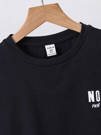 SHEIN طقم بيجاما كاجوال لتوين يتكون من بلوزة تي شيرت قصيرة الأكمام مع طباعة الأحرف وبنطال مربع الرسم