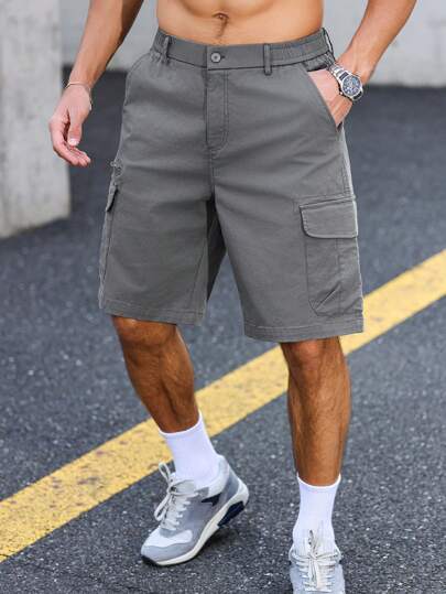 Manfinity Homme بنطال شورت كاجوال أمامي مزود بسحاب وجيب كارجو للرجال، لون أحادي
