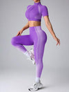 Seamluxe SHEIN Sport مجموعة رياضية تتكون من توب بأكمام قصيرة بتصميم اللونين المتناقضين وسروال ليغنغ