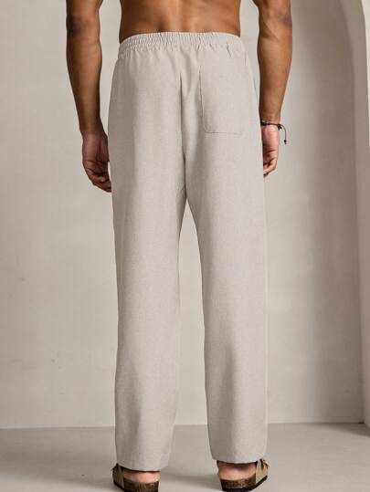 Manfinity VCAY بناطيل طويلة مستقيمة للرجال ذات خصر مرن وفضفاضة من القماش المنسوج باللون الأحادي