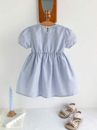 فساتين بيبي Cozy Pixies فستان للبنات الصغار بياقة دائرية وأكمام قصيرة منتفخة، مزين بفيونكة ثلاثية الأبعاد مع خصر مربوط