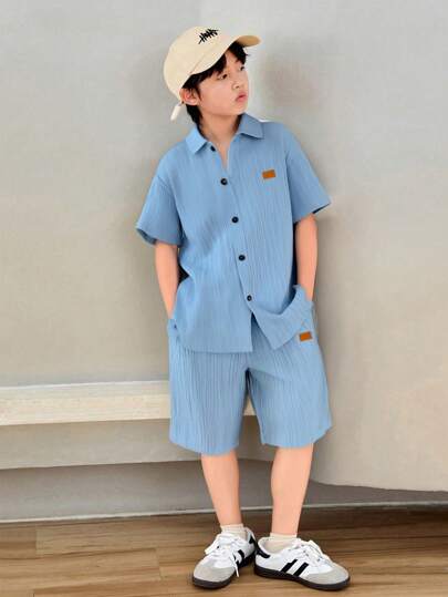 SHEIN بذلة قصيرة الأكمام قطعتين من نسيج ناعم ملمس لصبي المراهق، مناسبة للتنقل والمدرسة والاستخدام اليومي العادي والرياضة في الهواء الطلق خلال فصلي الربيع والصيف والرحلات البحرية