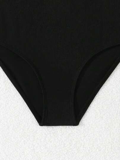 SHEIN بنطال سباحة صلب من قماش ملمس خاص للفئة العمرية ما بين الطفولة والمراهقة