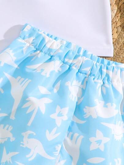 مايوه أولادي طقم قصير وبلوزة مطبوع عشوائية بأكمام رجلان وشورت مطبوع بأشجار النخيل 2 قطع لملابس السباحة للاطفال الولادنيون