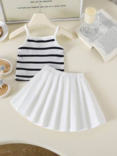 طقم ملابس علوية كامسول مخطط محبوك وتنورة بيضاء منسدلة مزينة للبنات الصغيرات في إجازة الصيف