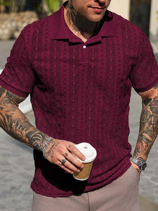 Manfinity CasualCool قميص بولو كاجوال برقبة واكمام قصيرة من قماش ذو ملمس نسيجي للرجال لون سادة