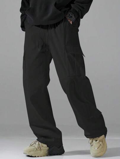 Manfinity Hypemode بنطلون كاجوال رجالي سليم بخطوط مستقيمة وفضفاض من اللون الأحادي