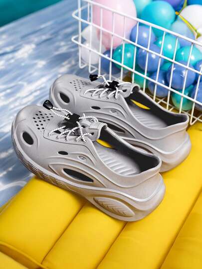 أحذية رياضية صيفية جديدة للرجال بفتحات مفرغة في الهواء الطلق أسلوب كاجوال، خفيفة الوزن، مانعة للانزلاق، ناعمة، بأربطة رياضية، أحذية آباء