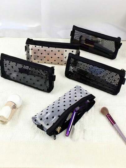 1 حقيبة تخزين شفافة للمساحيق والأحمر الشفاه من شبكة سوداء بشكل قلب