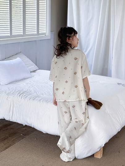 بيجاما طقم بيجامة مريح كاجوال، سترة قصيرة الأكمام مع جيب أمامي وبنطال تنويمة، مجموعة بيجامة قصيرة الأكمام ذات طباعة زهرية، للاستخدام المنزلي أو للعطلات