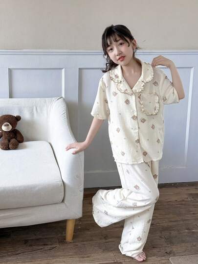 بيجاما طقم بيجامة مريح كاجوال، سترة قصيرة الأكمام مع جيب أمامي وبنطال تنويمة، مجموعة بيجامة قصيرة الأكمام ذات طباعة زهرية، للاستخدام المنزلي أو للعطلات