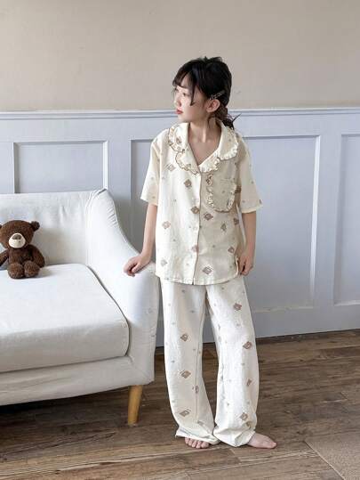 بيجاما طقم بيجامة مريح كاجوال، سترة قصيرة الأكمام مع جيب أمامي وبنطال تنويمة، مجموعة بيجامة قصيرة الأكمام ذات طباعة زهرية، للاستخدام المنزلي أو للعطلات