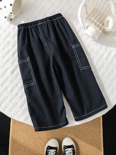 SHEIN بناطيل حمولة غير رسمية فضفاضة باللون الأسود مريحة وعصرية مناسبة للأطفال الذكور والإناث، مزودة بجيوب كبيرة، مناسبة للاستخدام داخل المنزل وخارجه، والارتداء اليومي، والرياضة، واللعب، والحفلات، والتصوير، والإجازات، في فصلي الربيع والصيف