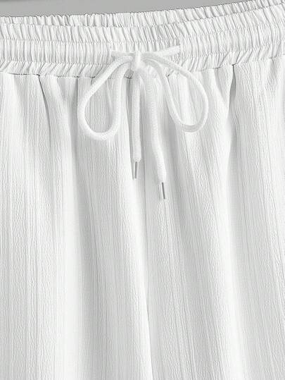 Manfinity RelaxMax بنطلون رجالي كاجوال متعدد الاستخدامات بلون سادة وقصة ضيقة