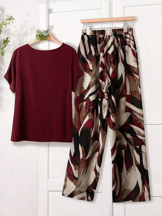 Rusticease مجموعة بنطلون واسع الساق مطبوع بالزهور ولباس علوي ذات رقبة دائرية وأكمام قصيرة باللون الواحد للمرأة، إطلالة صيفية مكونة من قطعتين