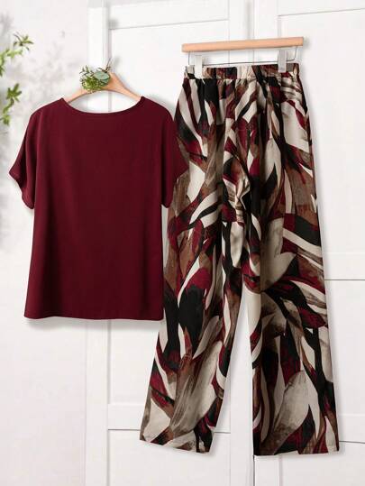 Rusticease مجموعة بنطلون واسع الساق مطبوع بالزهور ولباس علوي ذات رقبة دائرية وأكمام قصيرة باللون الواحد للمرأة، إطلالة صيفية مكونة من قطعتين