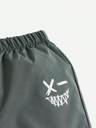 بنطال جوجر طفولي بنمط جرافيك جانبي قطع مريح بلون أحادي للأطفال الذكور