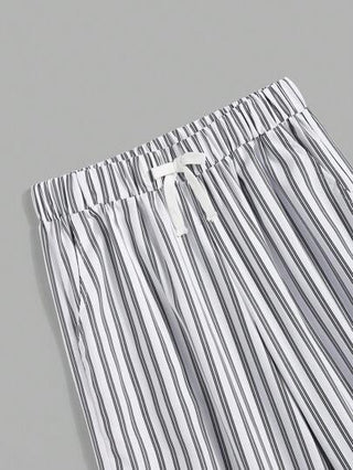 SHEIN بنطلون ذو خطوط للأولاد المراهقين ذو فخذ مستقيم سترايت وفضفاض