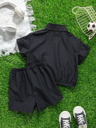 SHEIN مجموعة مكونة من 2 قطعة، ملابس علوية أطفال ولادي/بنات كاجوال فضفاضة ذات فتحة عنق طاقية وشورت خصر مطاطي، مناسبة للارتداء في الربيع والصيف، للداخل والخارج