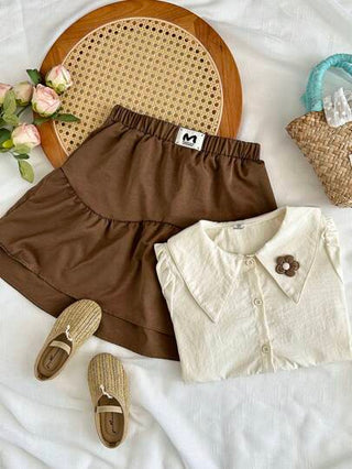 girls-sets Vintaside Kids طقم للبنات من قميص قصير الأكمام مناسب للصيف مع تنورة غربية عصرية وجذابة مثالي للموسم الصيفي. التصميم عملي وأنيق، يوفر الدفء والأناقة للخارج أو وقت الراحة في المنزل