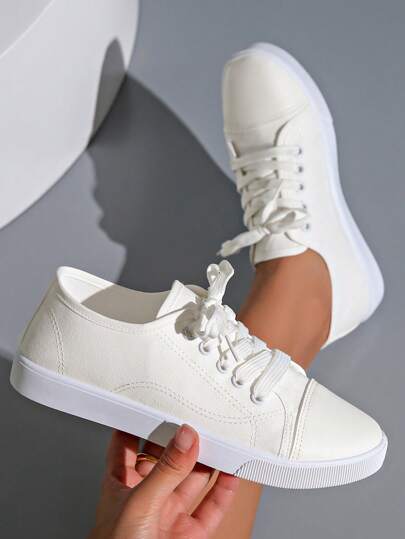 زوج من أحذية الكانفس الرياضية الخفيفة الوزن والمريحة للنساء، قابلة للتنفس وذات استخدامات متعددة، مناسبة لجميع المواسم - الصيف