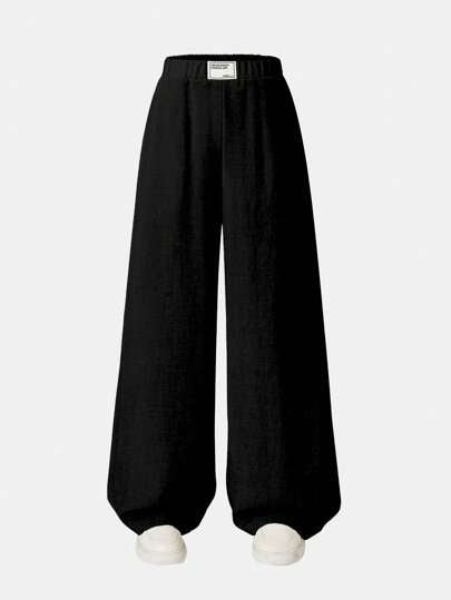 سروال مرتاح بخصر واسع للفتيات المراهقات، مزين بنقش 'بطاقة مطرزة