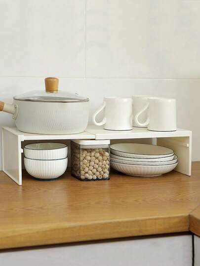 قطعة واحدة من رف مطبخ قابل للتوسيع، منظم خزانة سطح المطبخ البلاستيكي مع رفوف وأقسام قابلة للضبط للتوابل والأواني المطبخية، بدون تجميع، رفوف متعددة الطبقات، رف أدوات مطبخ