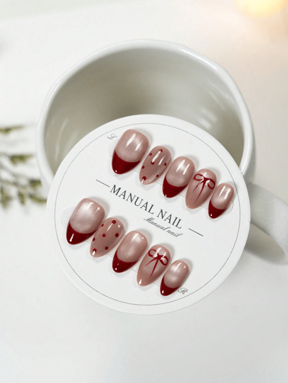 JUTI 10 قطعة أظافر مصنوعة يدويًا قصيرة ذات شكل لوز مع تصميم فرنسي بعين القطة وأكسسوار فيونكة | أظافر صناعية أنيقة للاستخدام اليومي والحفلات والأعراس