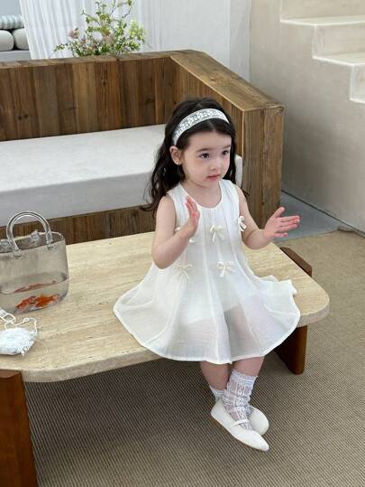 فساتين بيبي فستان حريمي أطفال قصير بياقة دائرية بلا أكمام باللون المشمشي، خفيف الوزن مناسب للاستخدام اليومي , الشاطئ ,العطلات