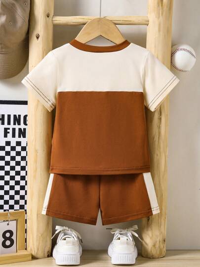 SHEIN Genkimix Kids بدلة طفل ورضيع أولاد كاجوال صيفية، قميص كم قصير رقبة على شكل V، وشورت رياضي مطبوع بشكل جرافيك، مناسبة للارتداء اليومي والمشاهدة الرياضية خلال الصيف