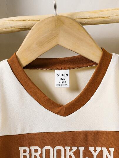 SHEIN Genkimix Kids بدلة طفل ورضيع أولاد كاجوال صيفية، قميص كم قصير رقبة على شكل V، وشورت رياضي مطبوع بشكل جرافيك، مناسبة للارتداء اليومي والمشاهدة الرياضية خلال الصيف